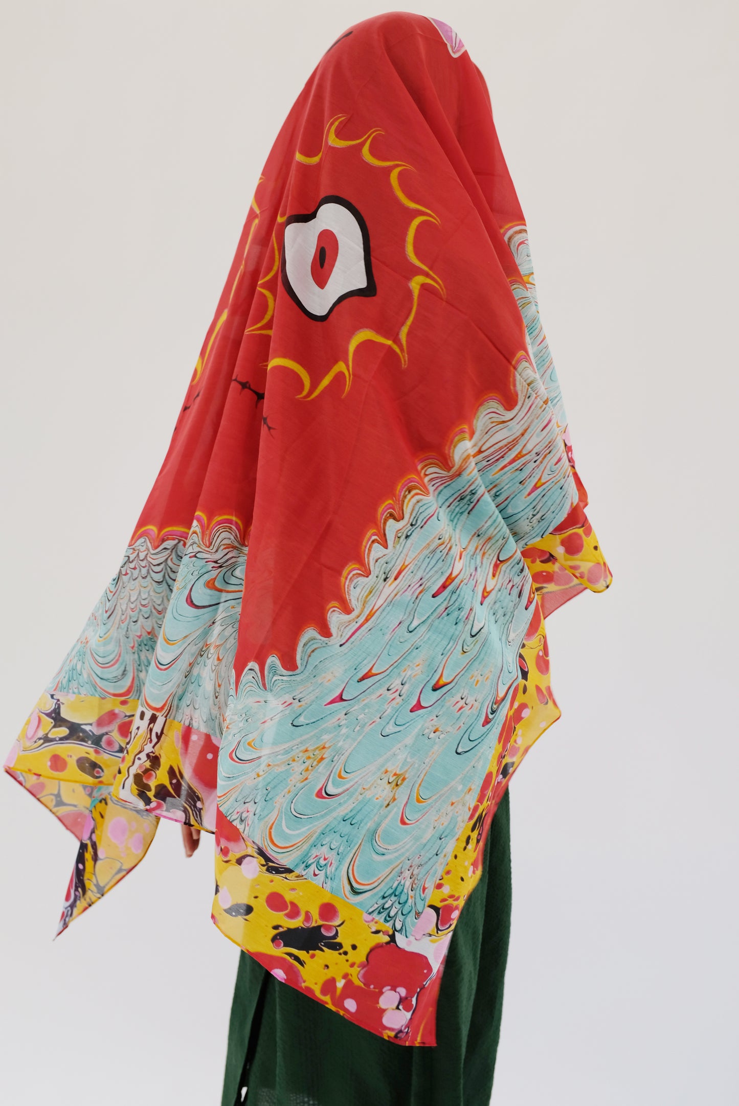 Colorful scarf with abstract patterns on a plain background. Beklina scarf.