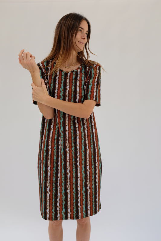 Beklina T Shirt Dress Alta's Ribbons. Model wearing a striped dress against a plain background.