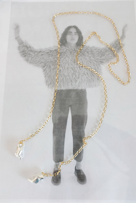 Beatriz Palacios Holding Hands Eyewear Chain