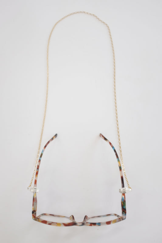 Beatriz Palacios Holding Hands Eyewear Chain