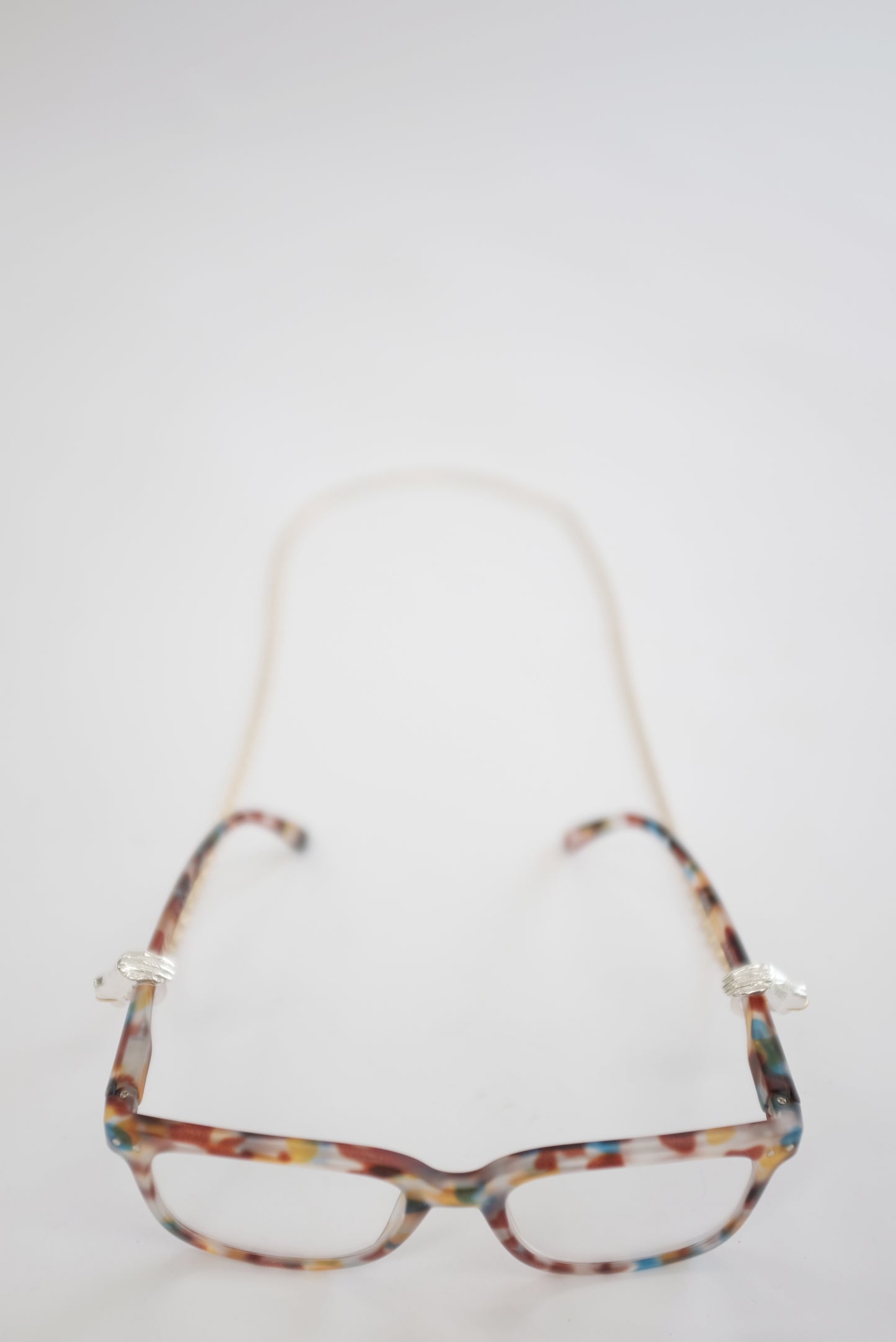 Beatriz Palacios Holding Hands Eyewear Chain